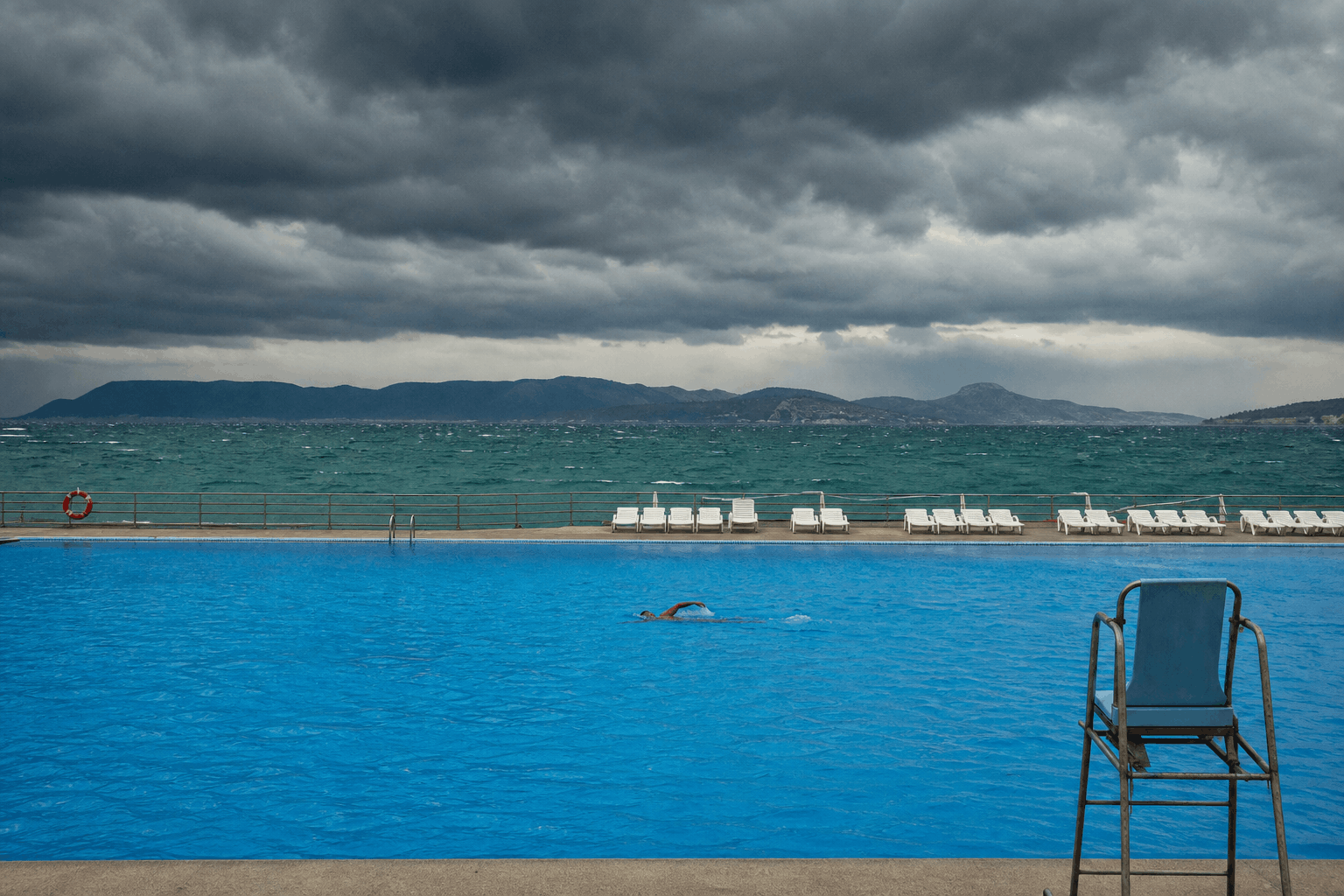 Changing sky over water symbolizing unpredictable outdoor air